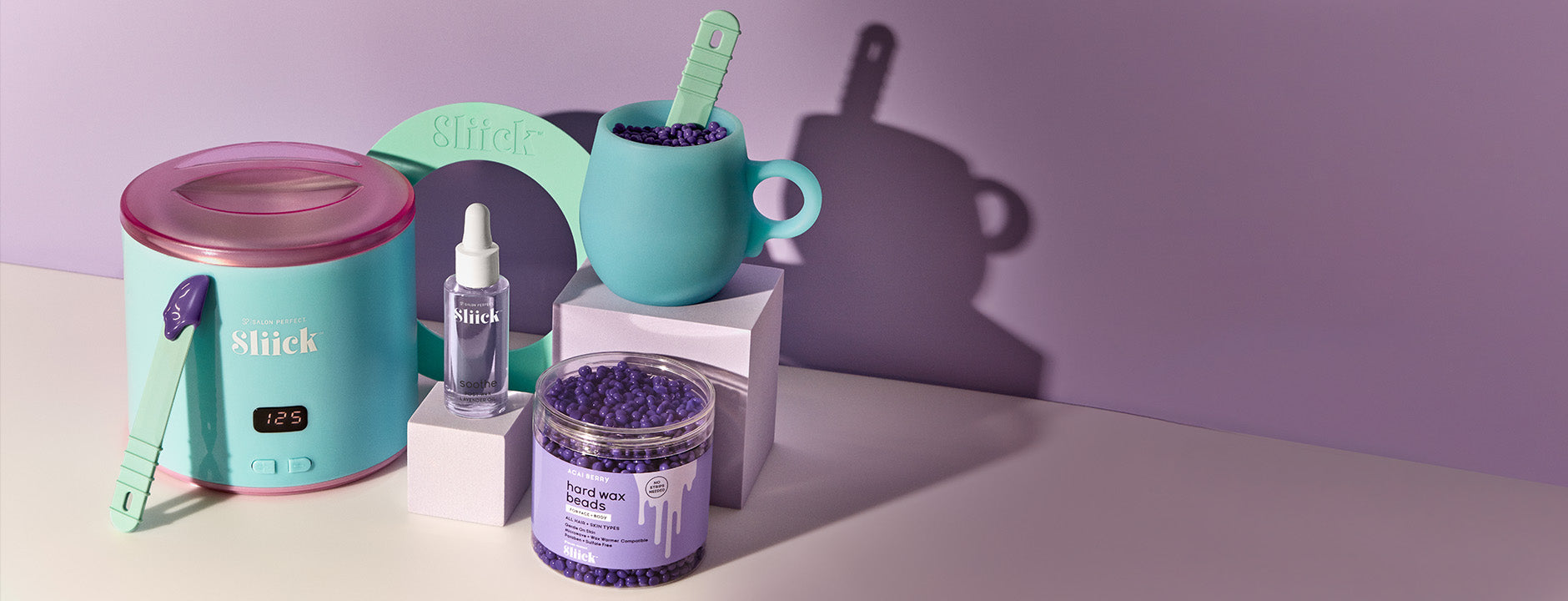 Sliick products including a warmer, serum bottle, and wax beads on a dark background.