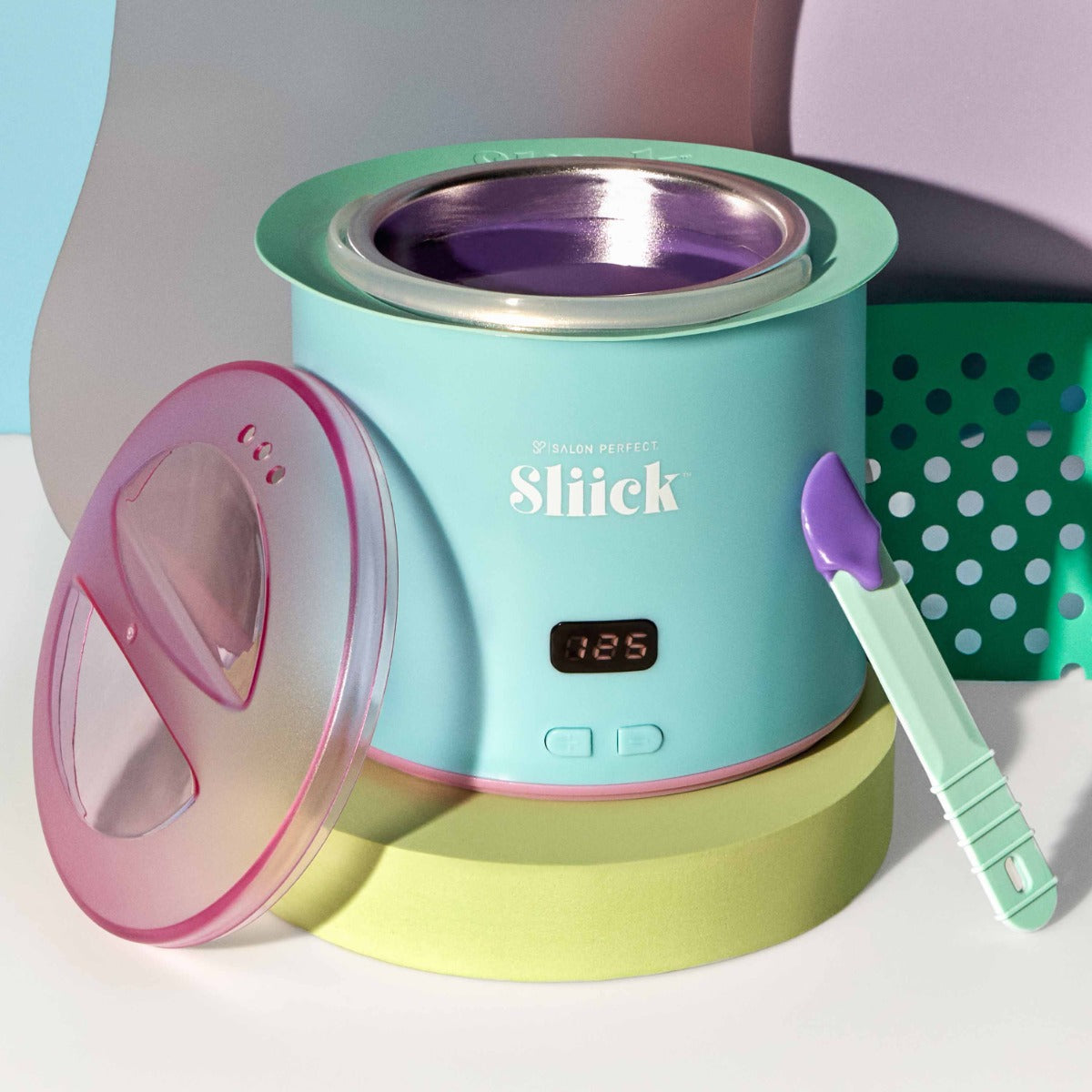 Sliick Pro Wax Warmer – Open lid showing melted purple hard wax, with digital temperature control and a spatula for strip-free waxing.